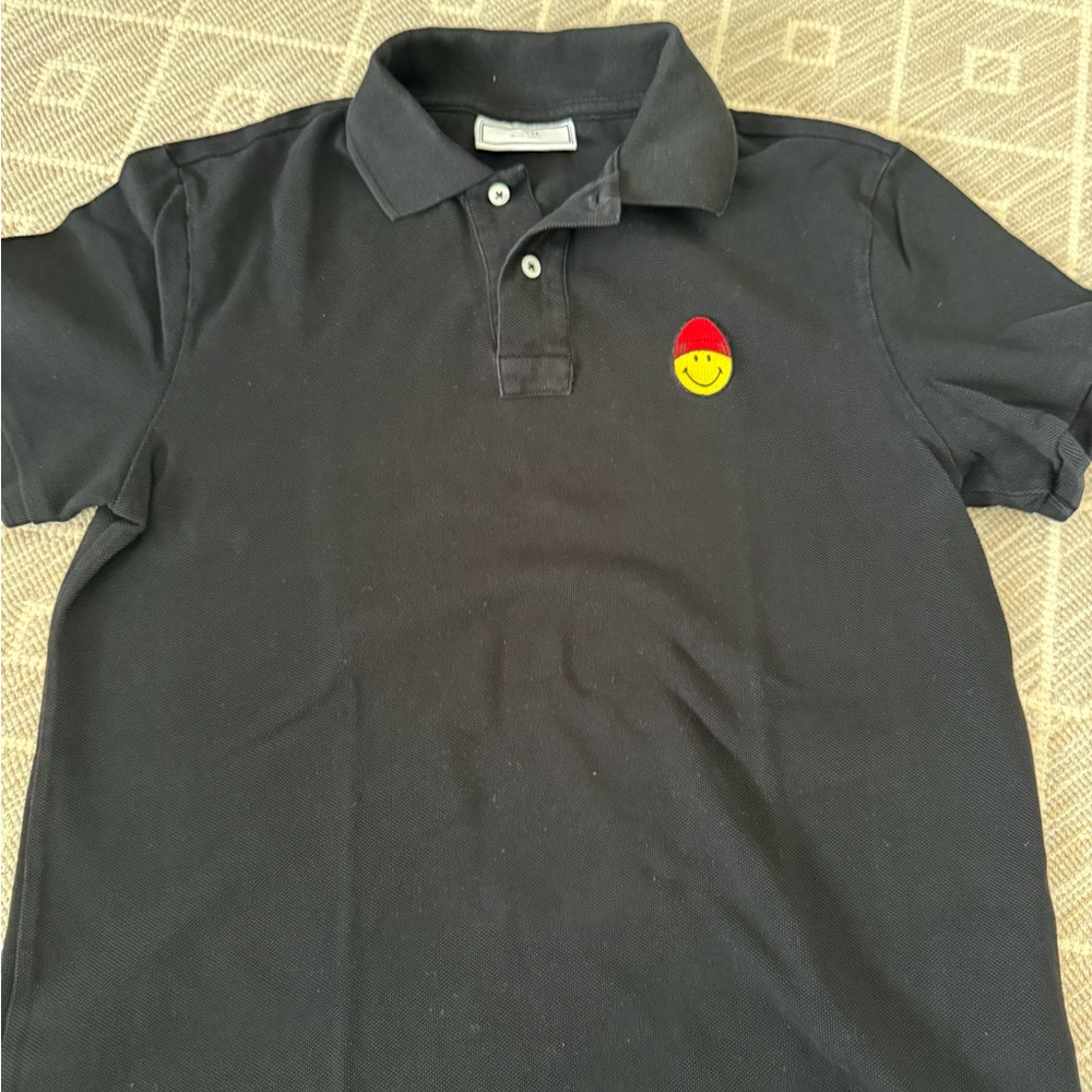 Ami Black Polo with Red Smiley Patch